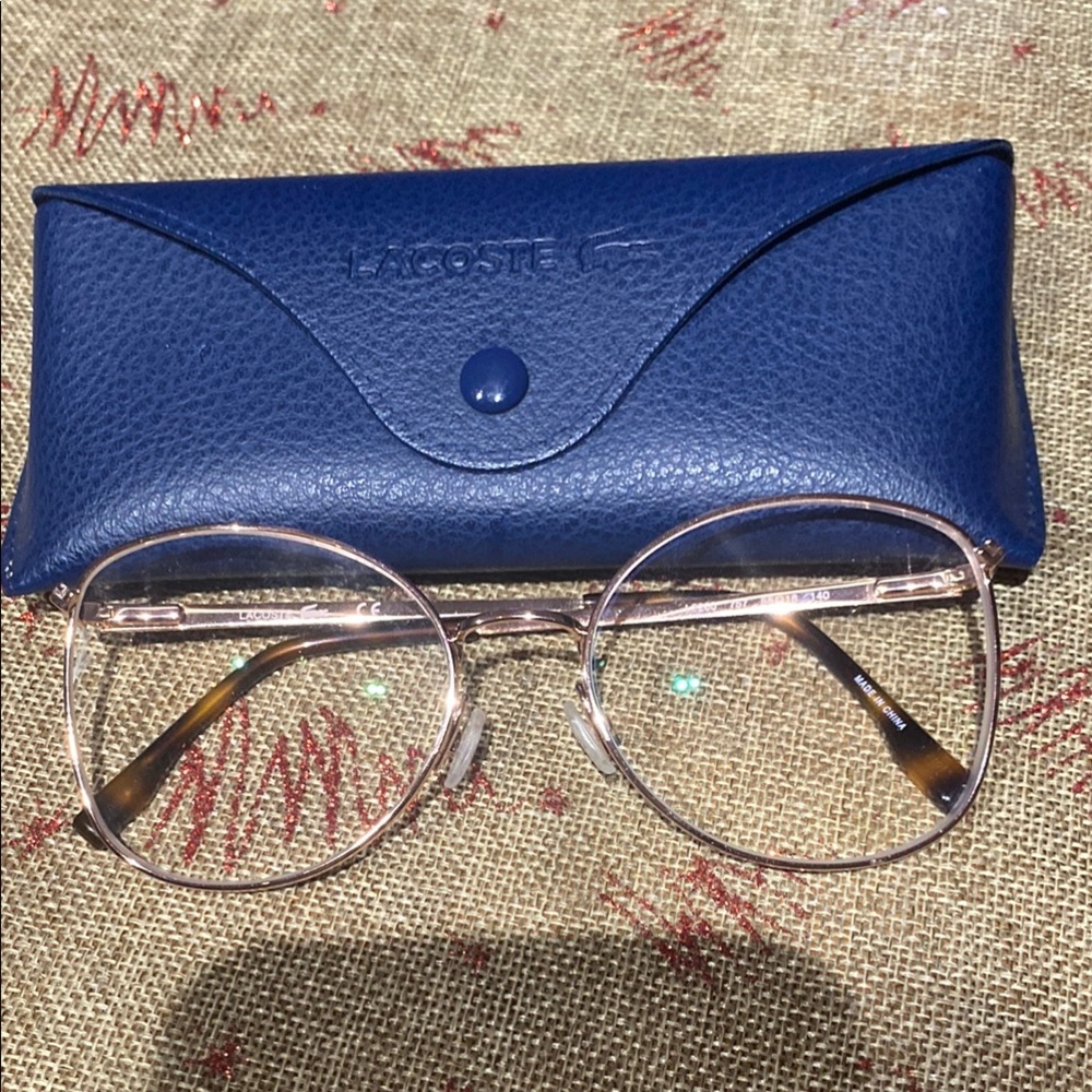 Lacoste Gold Frame Glasses with Blue Case prescription OD-0.25 OS-0.50